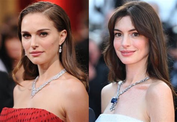 Anne Hathaway vs. Marion Cotillard at ‘TDKR’ premiere: who looked better in white?