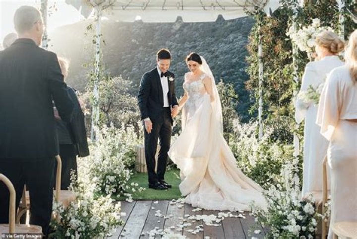 Gene Simmons’ daughter Sophie Simmons married her fiance in an intimate ceremony in her mother’s Malibu backyard