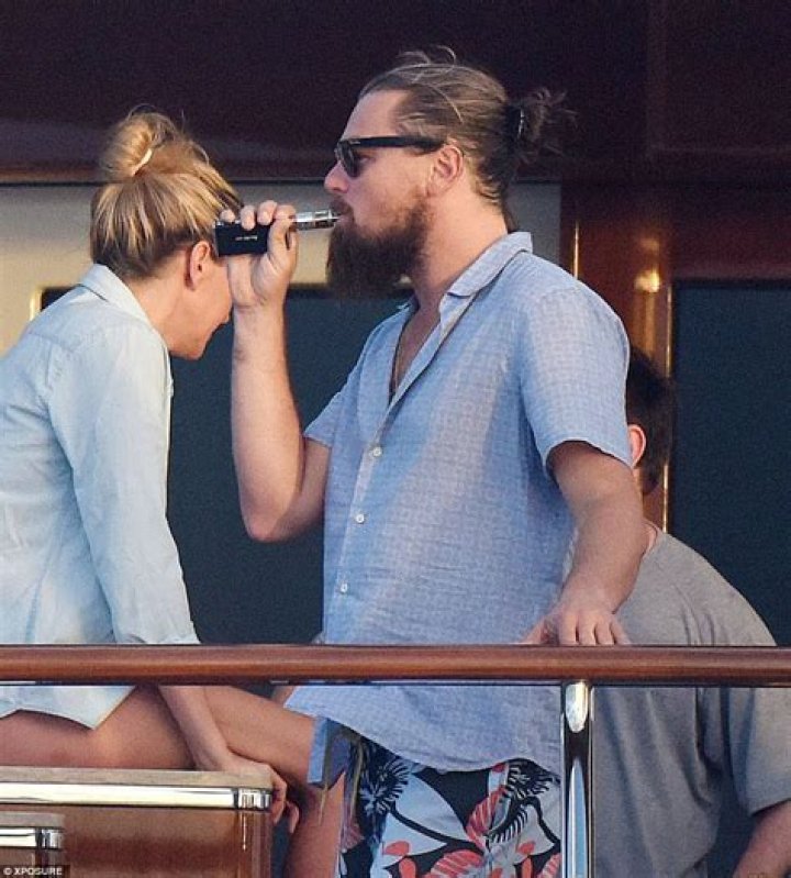 Star: Leonardo DiCaprio wears headphones & vapes during sex