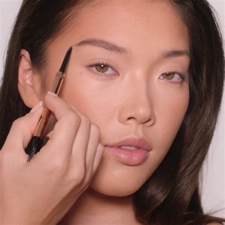 Thin 90s eyebrows are back with a twist, should you try them?