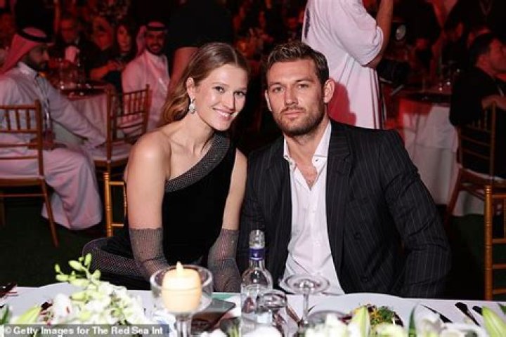 Toni Garrn wore a champagne slipdress for her Hamburg wedding to Alex Pettyfer